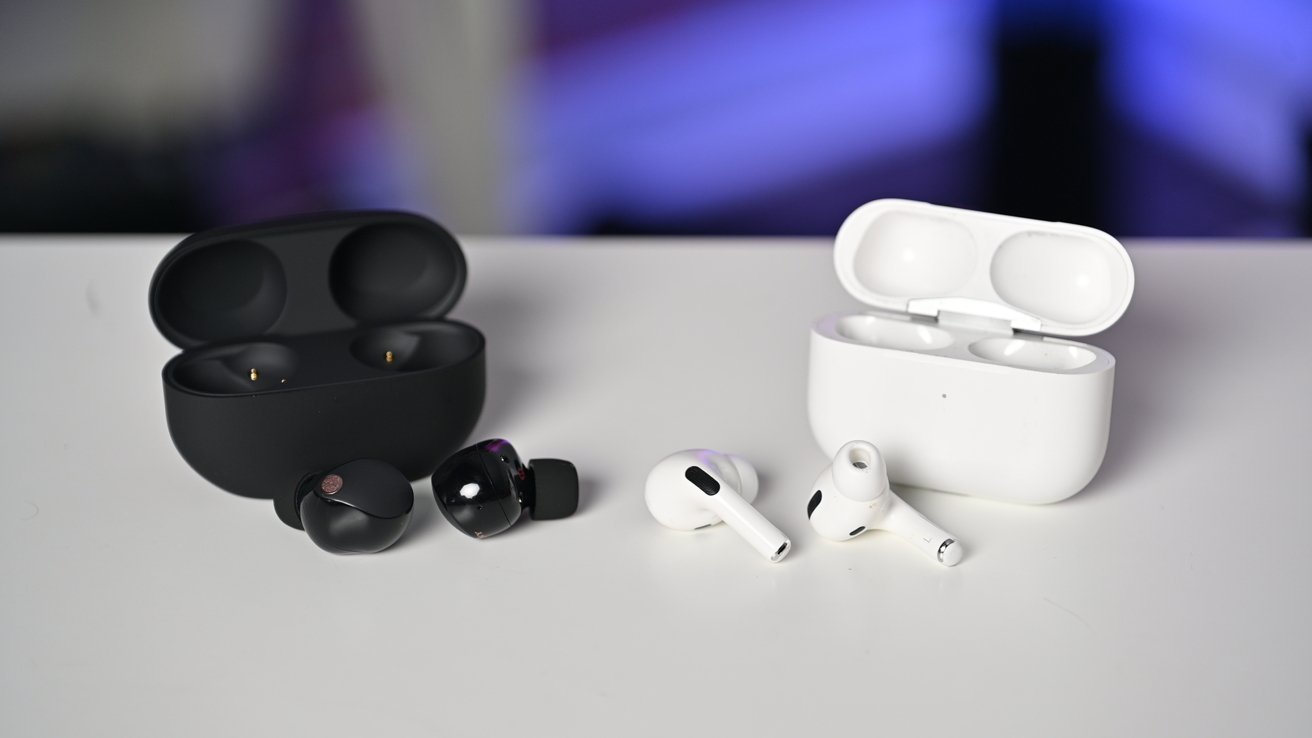 Sony WF-1000XM5 earbuds and charging case on a dark background