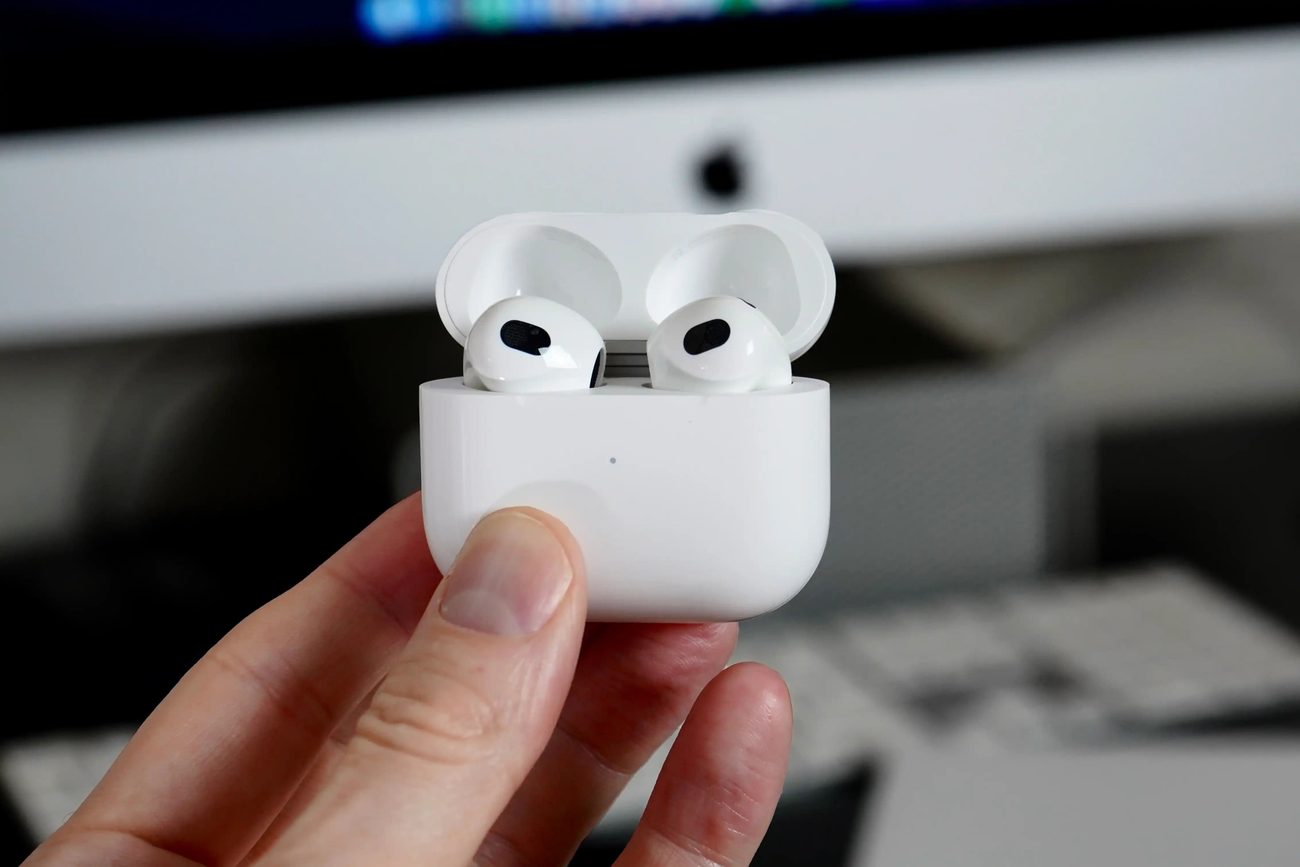 AirPods Pro 3 showing stem design and compact charging case
