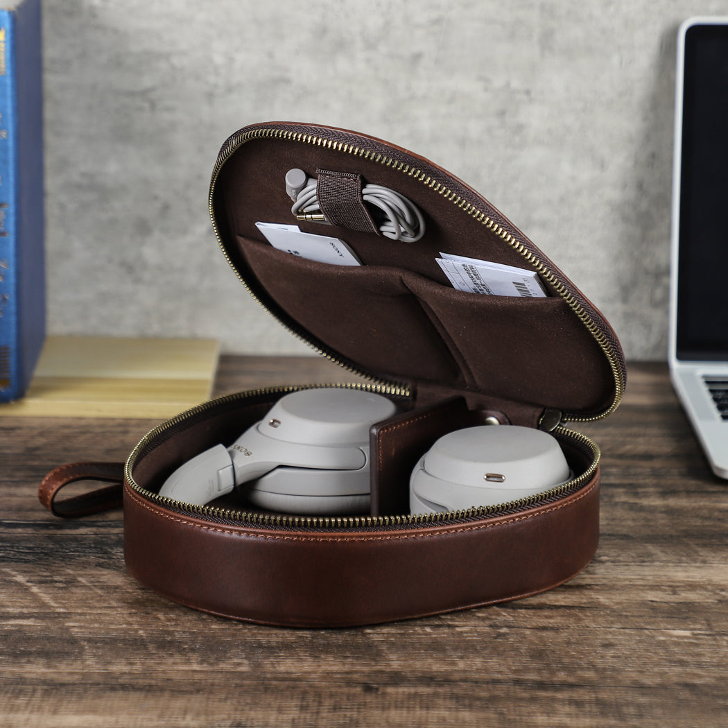 Premium full-grain brown leather case for Sony WF-1000XM6 with visible stitching